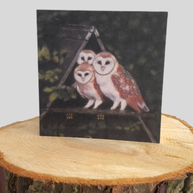 Barn Owls Greetings Card on log