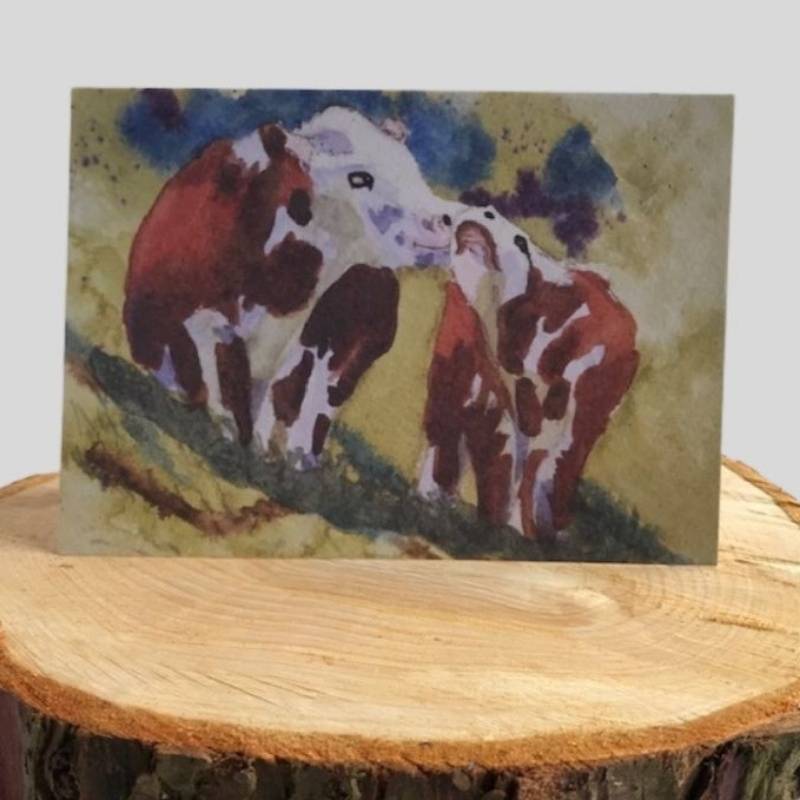 Cow & Calf Greetings Card on log
