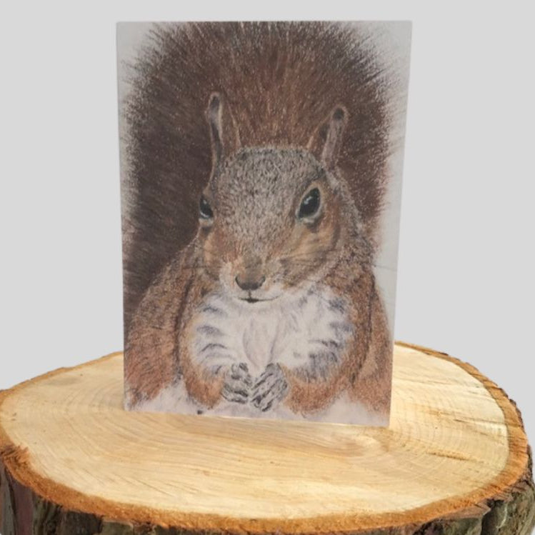Pastel Squirrel Greetings Card on log